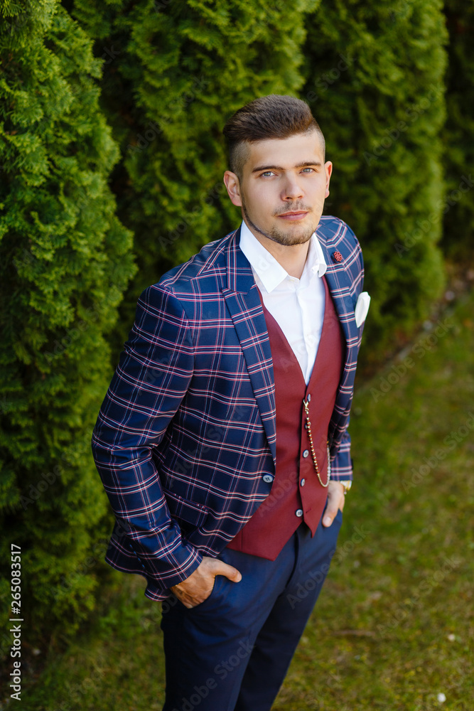 portrait of a stylish groom outdoors portrait of a stylish groom outdoors