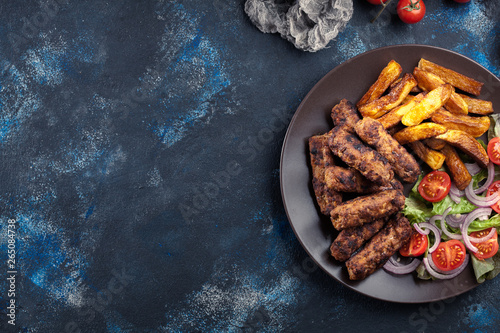 Kebapche or cevapcici, balkan minced meat kebab photo