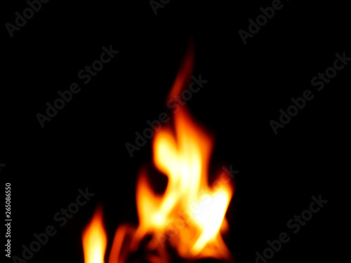 The fire that burns naturally during the night on a black background