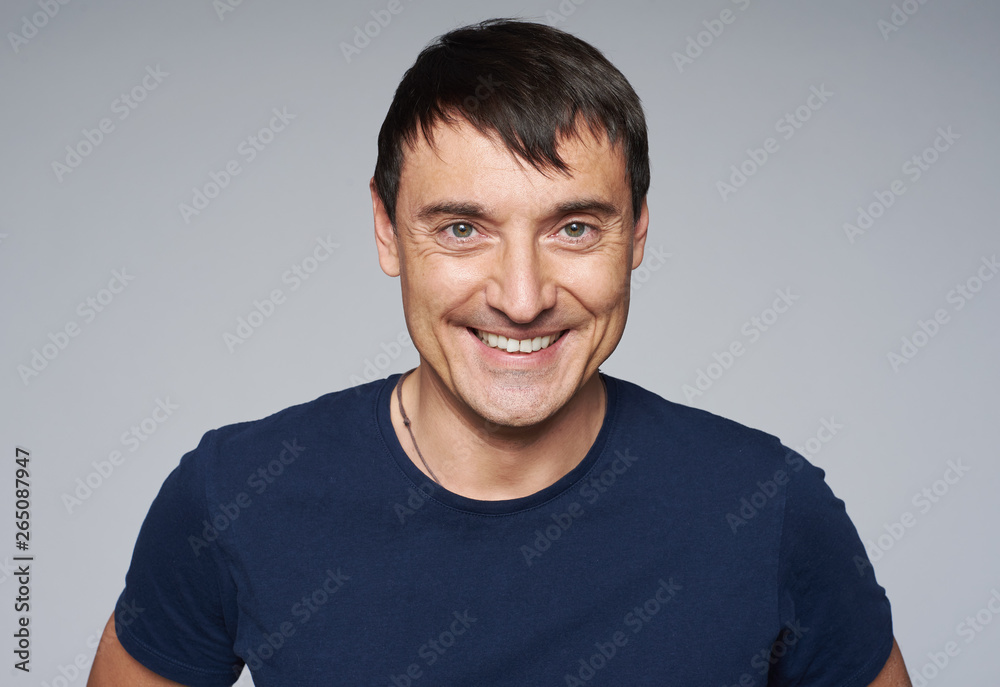happy smiling guy looking at camera isolated happy smiling guy looking at camera isolated