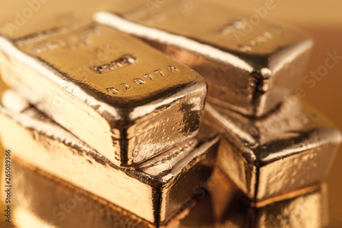 Precious shiny gold bars. Background for finance banking concept. Trade precious metals. Bullions.