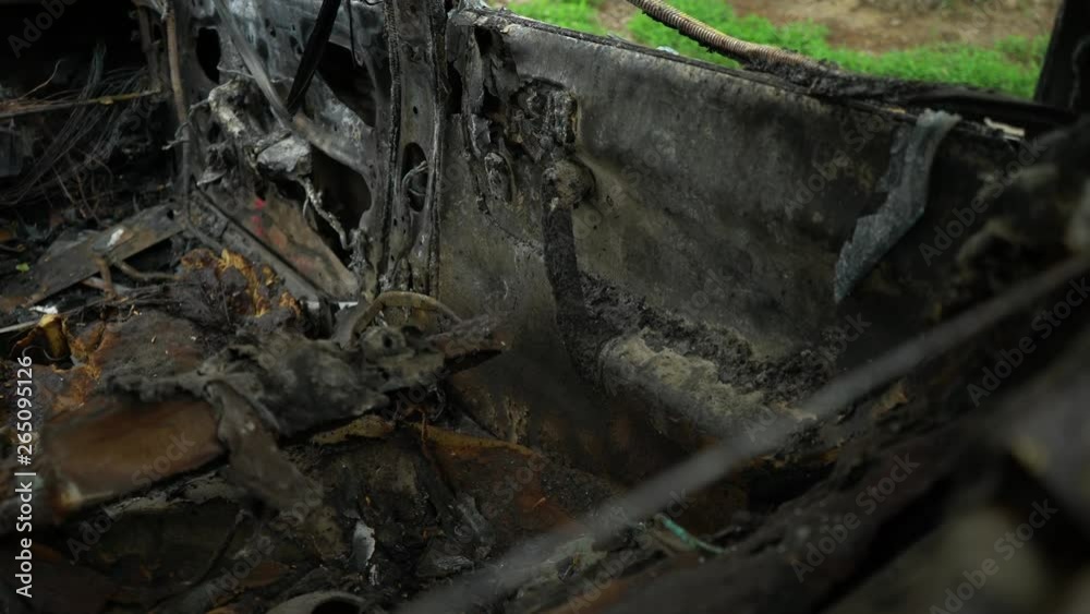 Car after the fire. Burnt car. Arson car. Accident on the road due to speeding. Effects of drinking alcohol. Murder. Criminal area. Explosion. Vandalism. Protests.
