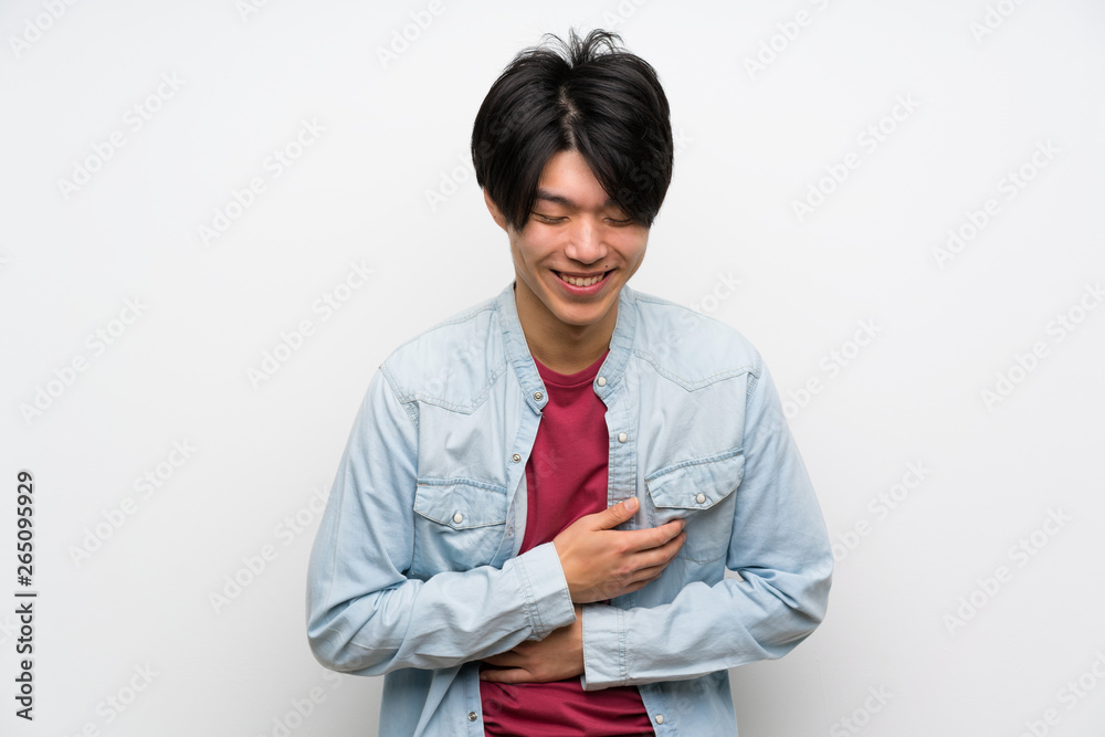 Asian man on isolated white background smiling a lot Asian man on isolated white background smiling a lot