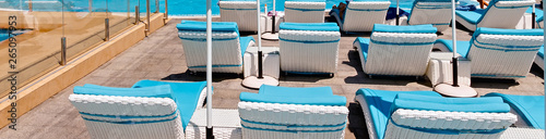 Wallpaper Mural Empty Sunbeds and umbrellas tropical beach Torontodigital.ca