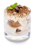 Classic tiramisu dessert in a glass isolated on a white background with clipping path