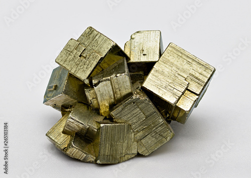 Pyrite isolated single shiny mineral stone, fool's gold, cubic gems, on white limbo background