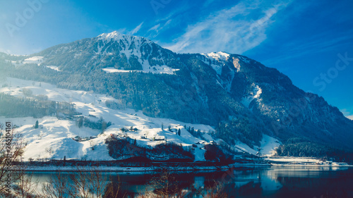 Beautiful winter scenery in the Alps with snowy mountain