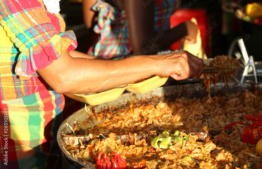 Arm of girl on the street food stand