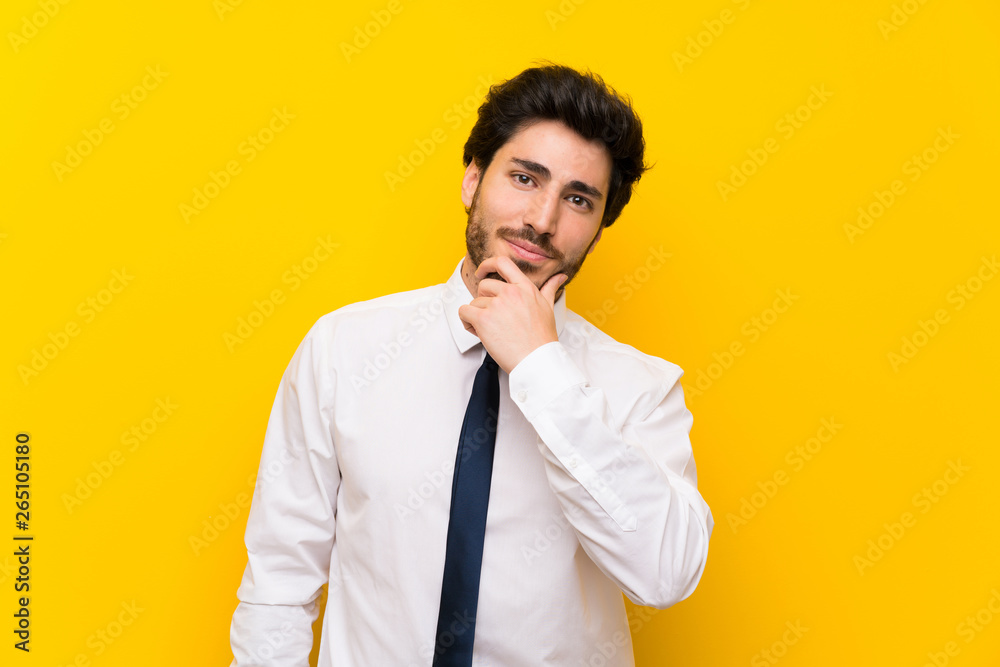 Businessman on isolated yellow background laughing Businessman on isolated yellow background laughing