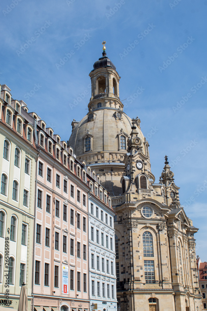 Dresden, Germany, restored Baroque architecture. Pompous and majestic city streets, tourists and transport on the holiday of Easter.