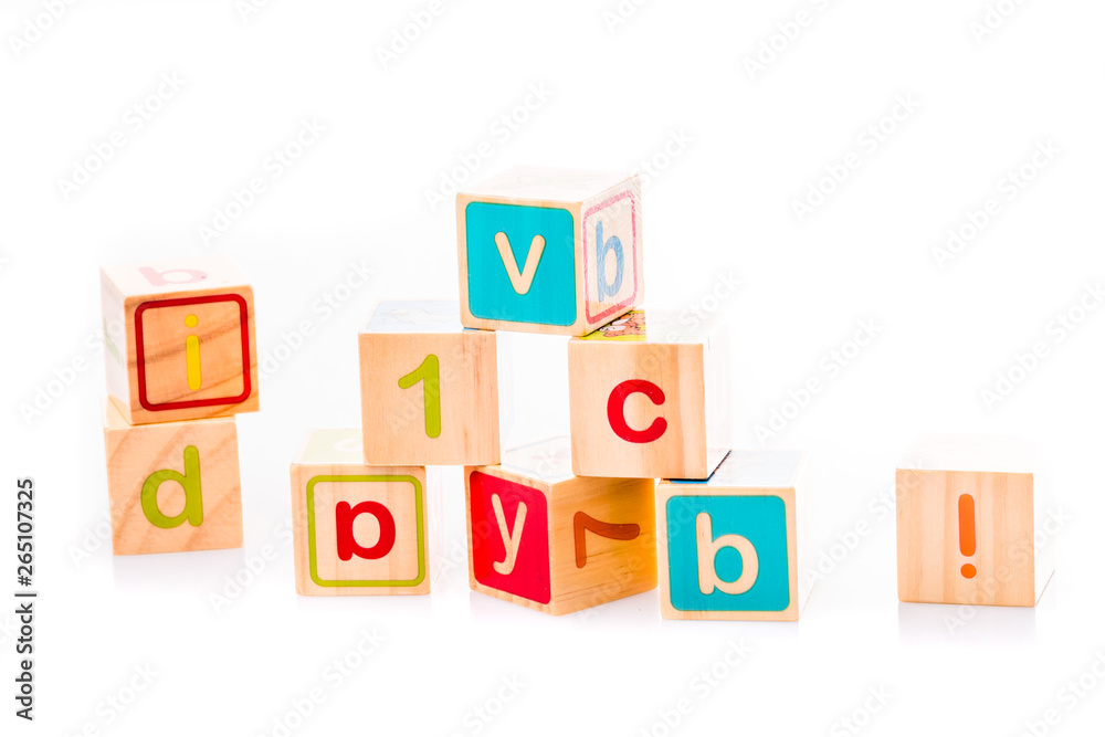 Toy cubes. Baby collection. ABC letters made from baby toys Toy cubes. Baby collection. ABC letters made from baby toys