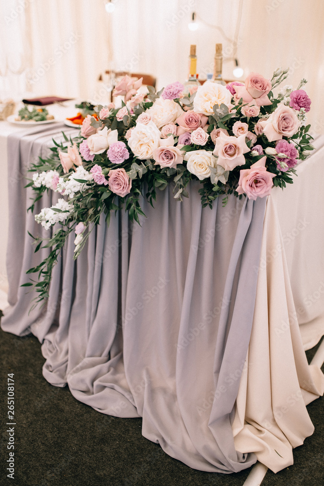 Beautiful decoration of a table at the wedding reception. Beautiful decoration of a table at the wedding reception.
