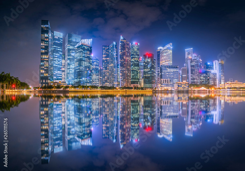 Singapore Skyline and view of skyscrapers on Marina Bay at twilight time.