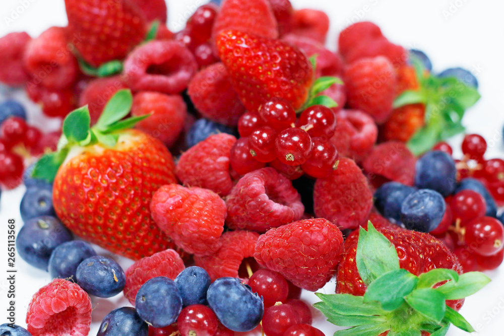 Obraz premium assorted fresh berries with white background