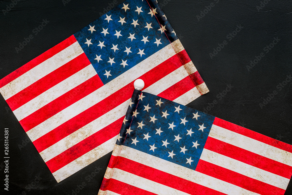 Fototapeta premium Memoral day of United States of America with flag on black background top view