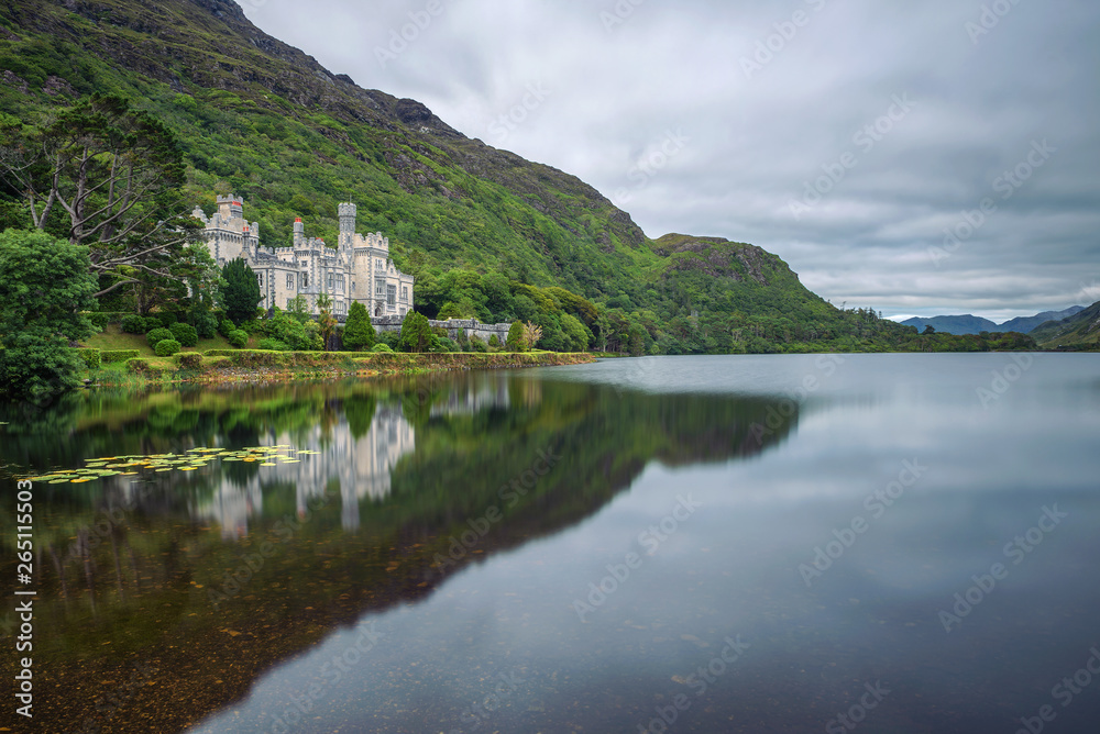Kylemore Abbey in Ireland with reflections in the Pollacapall Lough