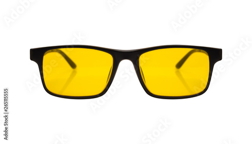Single sunglasses with black plastic frame and yellow glass