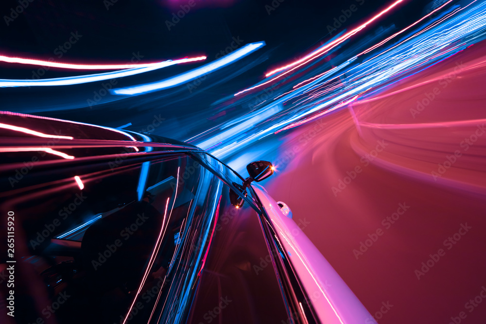 POV of car driving at night city with motion blur