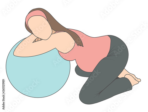 Pregnant woman with labor support peanut ball