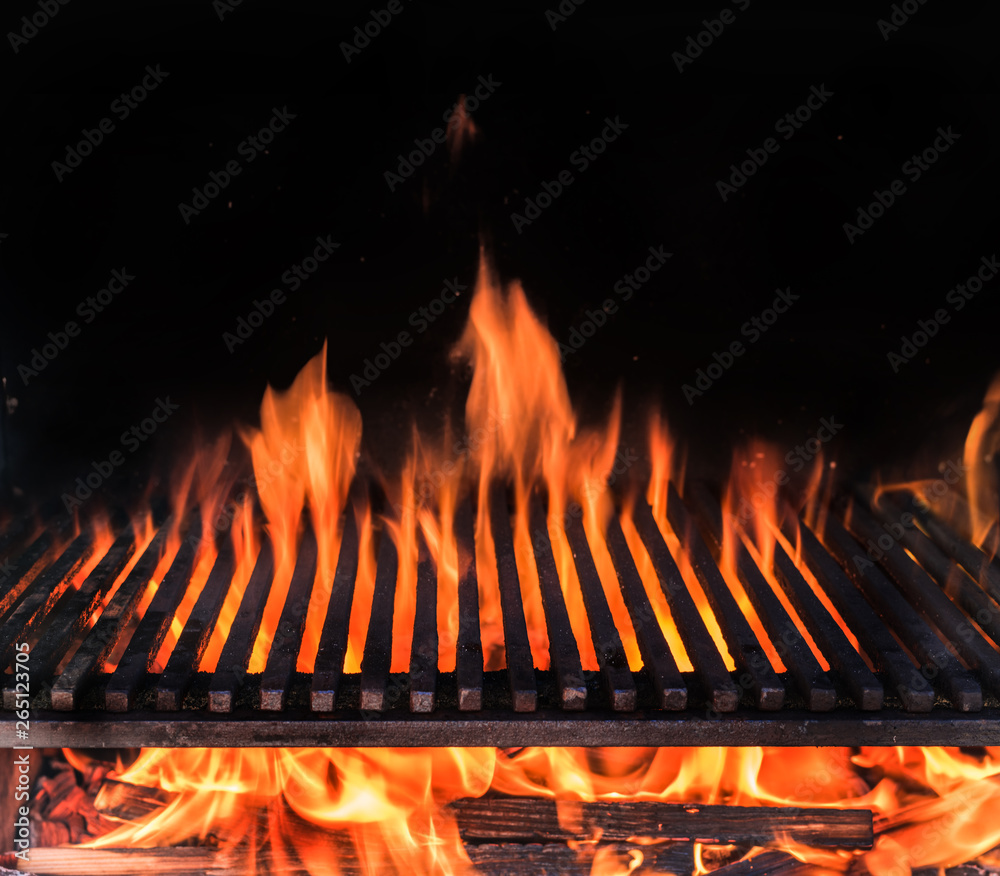 Empty grill grate and tongues of fire flame. Barbeque night background. Empty grill grate and tongues of fire flame. Barbeque night background.