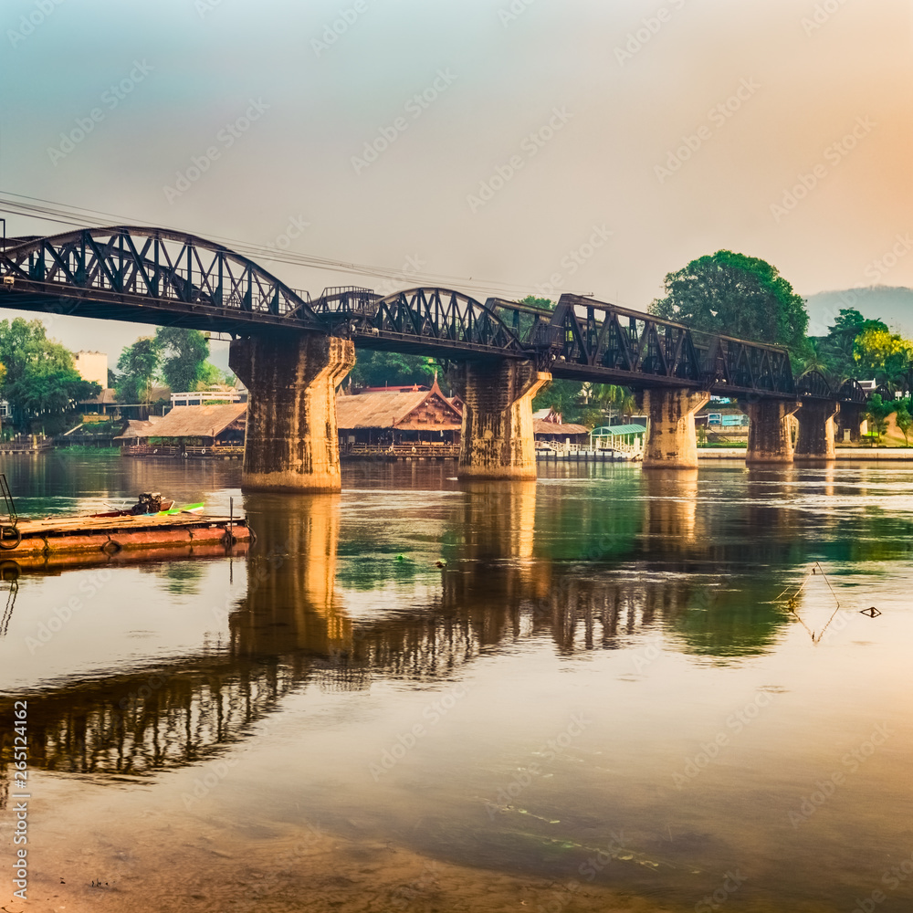 The bridge on the river Kwai at sunrise. Railway in Kanchanaburi, Thailand The bridge on the river Kwai at sunrise. Railway in Kanchanaburi, Thailand