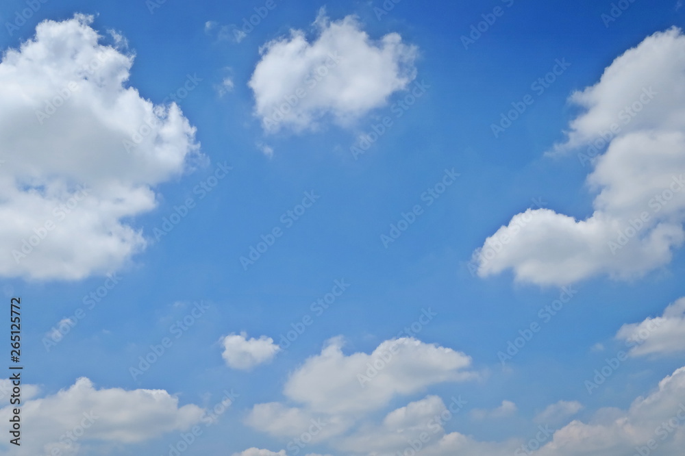 Clear blue sky with white clouds in summer time. Nature background concept. Clear blue sky with white clouds in summer time. Nature background concept.