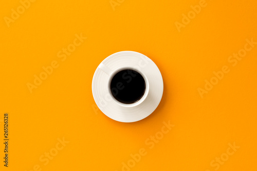 black coffee on yellow background 