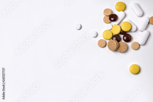 pills on a white  background with copyspace macro wiew