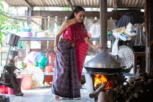 Beautiful woman cooking , Thai culture style