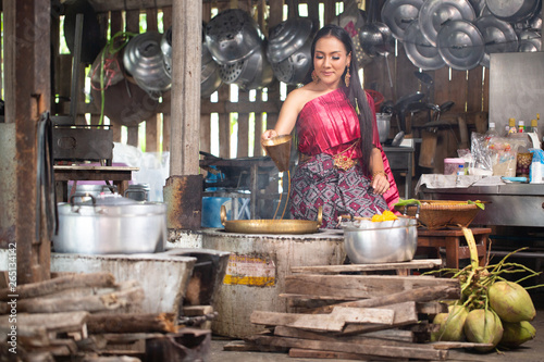 Beautiful woman cooking , Thai culture style