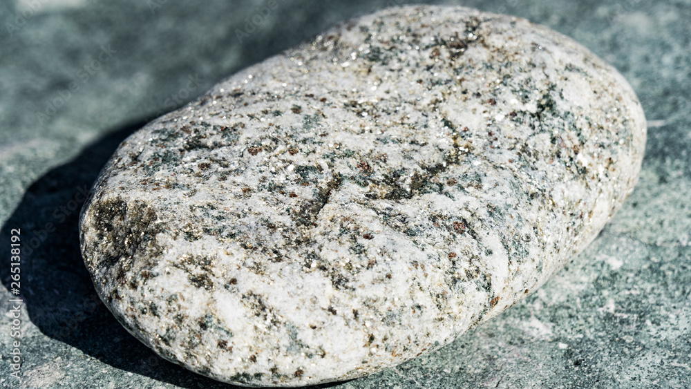 Sparkling stone from the Black Sea, Sochi, Russia. Sparkling stone from the Black Sea, Sochi, Russia.
