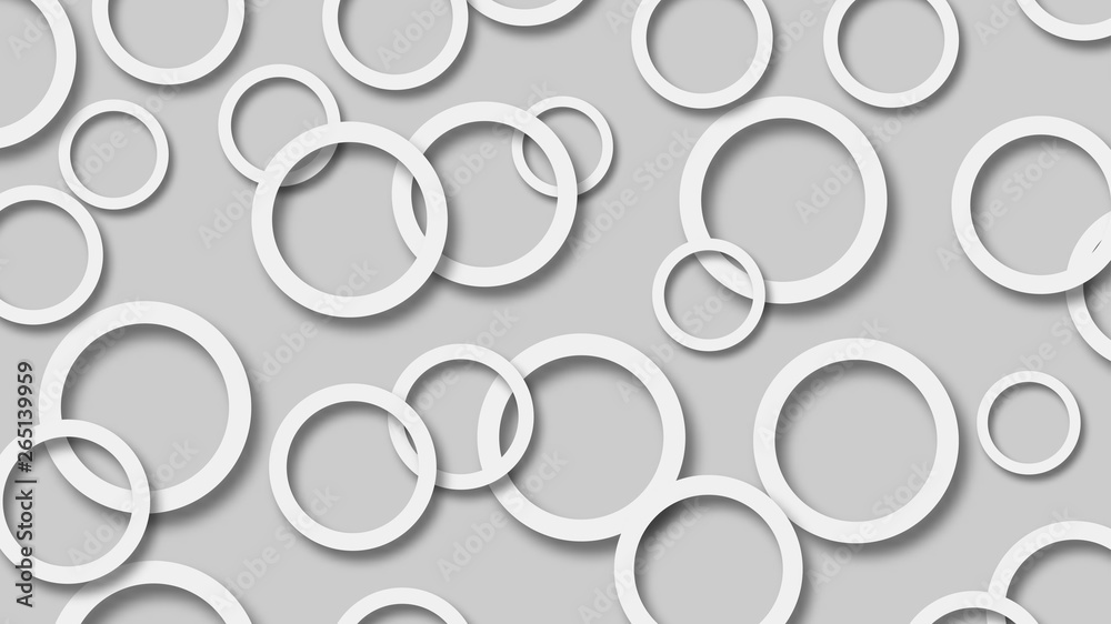 Abstract illustration of randomly arranged white rings with soft shadows on gray background