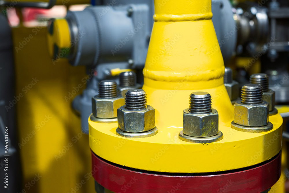 Steel pipeline with flanges. The flanges are fastened with powerful bolts with nuts Steel pipeline with flanges. The flanges are fastened with powerful bolts with nuts