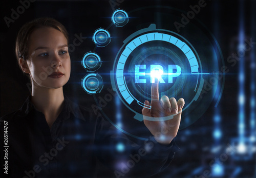 The concept of business, technology, the Internet and the network. A young entrepreneur working on a virtual screen of the future and sees the inscription: ERP