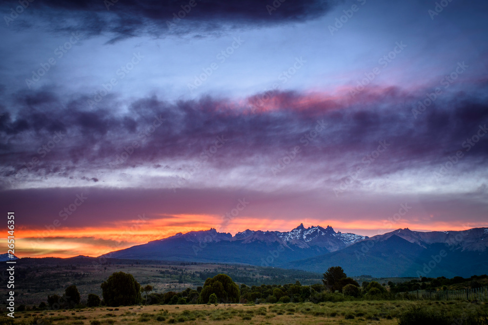 Colorful sunset against Andes mountains during summer in Patagonia, Argentina Colorful sunset against Andes mountains during summer in Patagonia, Argentina
