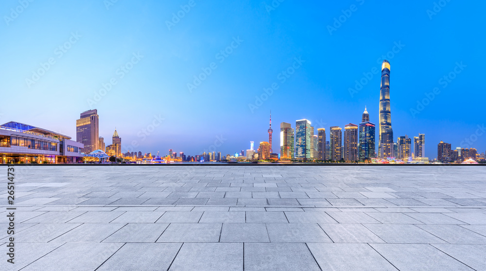 Shanghai modern commercial office buildings and square floor at night,panoramic view