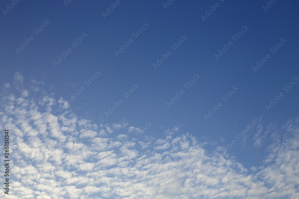 sunlight shiny through white cloud on blue sky background