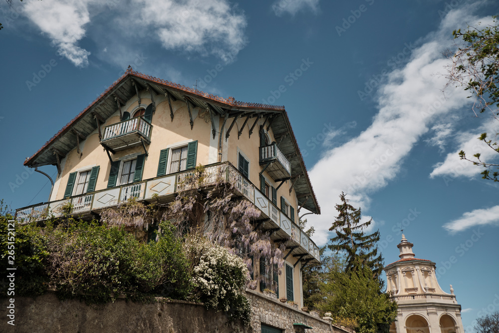 Fototapeta premium monumets and one of the XIVchapel along the path of the historic pilgrimage route from Sacred Mount or Sacro Monte of Varese