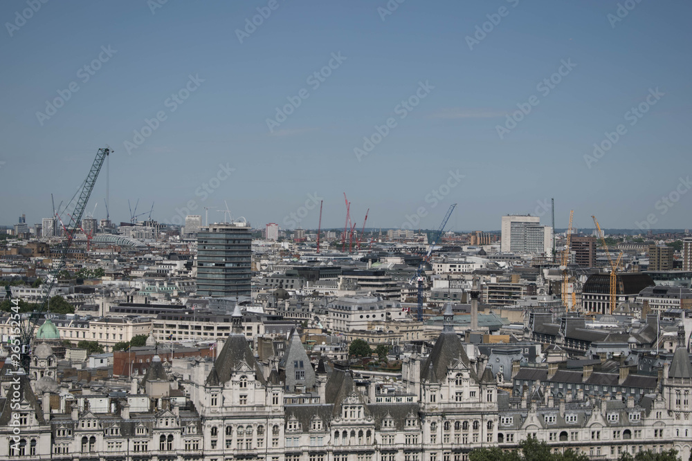 Doll image of cityscape of London from the London Eye with cranes and constructions all over, probably the reconstruction of the city approved by the council.