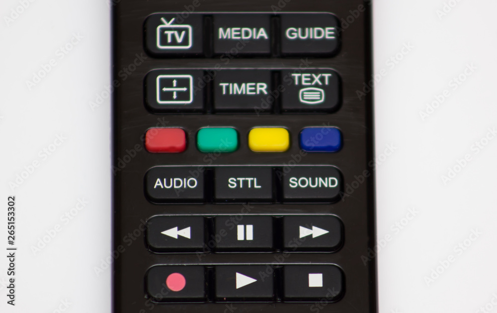 Part of a remote control with numbers, media, guide buttons isolated on a white background Part of a remote control with numbers, media, guide buttons isolated on a white background