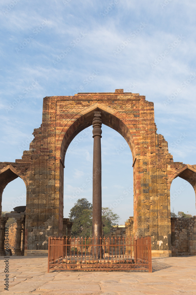 Iron Pillar at Qutub Minar with no people in New Delhi India