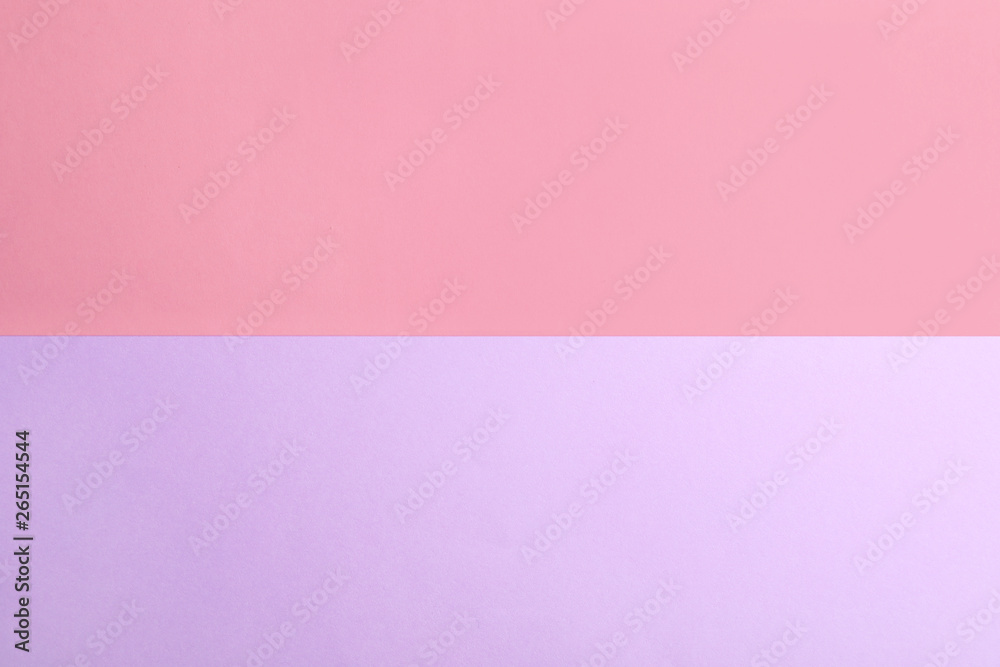 Violet and pink paper sheets as colorful background, top view