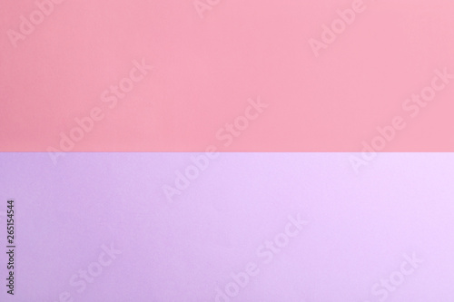Violet and pink paper sheets as colorful background, top view