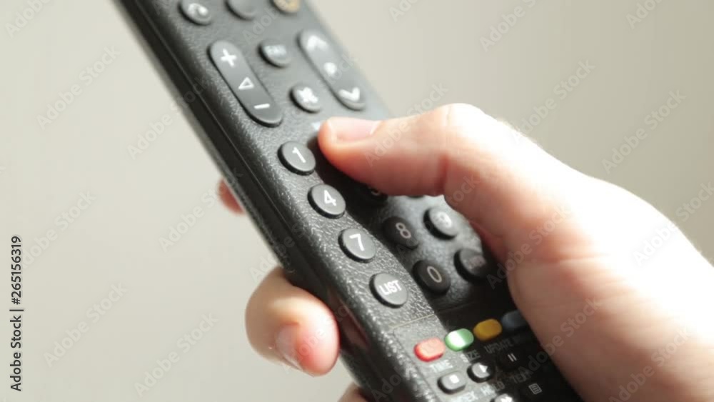 Hand dialing a number of digits. Press the buttons on the TV remote.