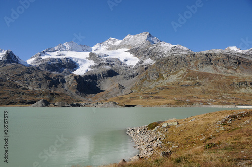Panoramic swiss mountain landscape with Lago Bianco at Bernina Hospitz in the Engadina.