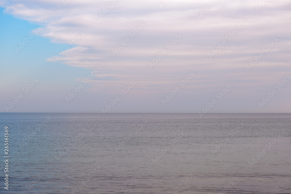 Seascape at sunset Horizontal natural background.