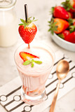 Healthy strawberry smoothie in glass