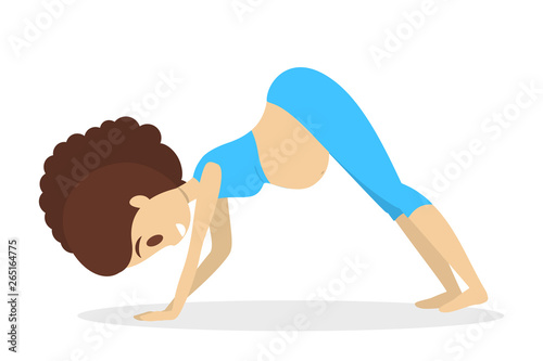 Pregnant woman doing yoga exercise. Pregnancy and fitness