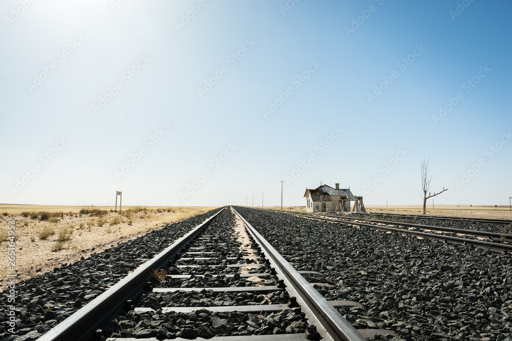 Railway to the horizon, left house on the right Railway to the horizon, left house on the right