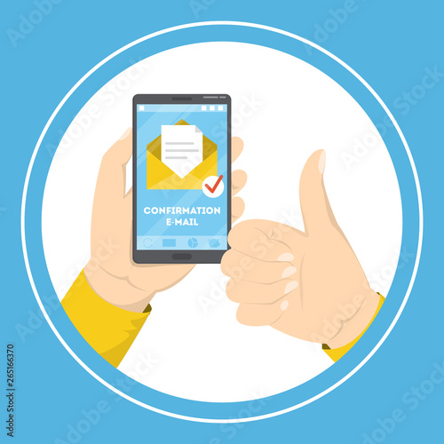 Hand holding mobile phone with a confirmation e-mail